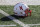 A Nebraska helmet is seen on the field during the second half an NCAA college football game against Minnesota, Saturday, Oct. 17, 2015, in Minneapolis. (AP Photo/Ann Heisenfelt)