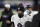 FILE - Baltimore Ravens quarterback Lamar Jackson (8) leaves the field after the first half of an NFL divisional round football game against the Buffalo Bills in Orchard Park, N,Y., in this Saturday, Jan. 16, 2021, file photo. Ravens general manager Eric DeCosta has already started making some of the tough decisions he believes can help Baltimore negotiate the leap from playoff qualifier to Super Bowl champion. After releasing running back Mark Ingram and quarterback Robert Griffin III last week, DeCosta announced Monday, Jan. 25, 2020, that the Ravens won't re-sign All-Pro long snapper Morgan Cox, the initial component of the highly successful placekicking trio that includes holder Sam Koch and second-team All-Pro Justin Tucker, the most accurate field goal kicker in NFL history.(AP Photo/Adrian Kraus, File)