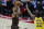 Portland Trail Blazers guard Damian Lillard shoots a 3-point basket over Golden State Warriors forward Andrew Wiggins during the second half of an NBA basketball game in Portland, Ore., Wednesday, March 3, 2021. (AP Photo/Craig Mitchelldyer)