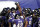 Baltimore Ravens players huddle prior to an NFL football game against the New York Giants, Sunday, Dec. 27, 2020, in Baltimore. (AP Photo/Nick Wass)