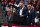 President Donald Trump looks on as Ultimate Fighting Championship president Dana White speaks during a campaign rally at The Broadmoor World Arena, Thursday, Feb. 20, 2020, in Colorado Springs, Colo. (AP Photo/Evan Vucci)