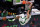 Boston Celtics forward Jayson Tatum (0) hangs on the rim after dunking during the first half of an NBA basketball game against the Toronto Raptors, Thursday, March 4, 2021, in Boston. (AP Photo/Charles Krupa)