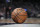 Spalding basketball in the first half of an NBA basketball game Wednesday, Jan. 15, 2020, in Denver. (AP Photo/David Zalubowski)