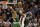 Miami Heat's Chris Bosh (1) slides between Boston Celtics players Kevin Garnett (5) and Paul Pierce (34) during the second half of a NBA basketball game in MIami, Tuesday, Oct. 30, 2012. The Heat won 120-107. (AP Photo/J Pat Carter)