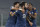 Porto's Sergio Oliveira, center, celebrates with Luis Diaz and Wilson Manafa, right, after scoring his side's second goal during the Champions League, round of 16, second leg, soccer match between Juventus and Porto in Turin, Italy, Tuesday, March 9, 2021. (AP Photo/Luca Bruno)