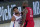 Philadelphia 76ers' Tobias Harris (12) drives into Houston Rockets' P.J. Tucker (17) during the first half of an NBA basketball game Friday, Aug. 14, 2020, in Lake Buena Vista, Fla. (AP Photo/Ashley Landis, Pool)
