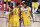 Los Angeles Lakers forward LeBron James (23) and forward Kyle Kuzma (0) and guard Kentavious Caldwell-Pope, second from right, and forward Anthony Davis (3) huddle during the first half against the Portland Trail Blazers during Game 2 of an NBA basketball first-round playoff series, Thursday, Aug. 20, 2020, in Lake Buena Vista, Fla. (Kim Klement/Pool Photo via AP)