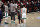 Brooklyn Nets guard Kyrie Irving (11) talks with Boston Celtics forward Jayson Tatum (0) after their NBA basketball game, Thursday, March 11, 2021, in New York. The Nets won 121-109. (AP Photo/Adam Hunger)