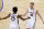 Virginia forward Sam Hauser (10) and Virginia guard Trey Murphy III (25) celebrate a basket during the second half of an NCAA college basketball game in the quarterfinal round of the Atlantic Coast Conference tournament in Greensboro, N.C., Thursday, March 11, 2021. (AP Photo/Gerry Broome)