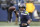 Seattle Seahawks quarterback Russell Wilson readies a pass against the Los Angeles Rams during the first half of an NFL wild-card playoff football game, Saturday, Jan. 9, 2021, in Seattle. (AP Photo/Ted S. Warren)