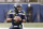 Seattle Seahawks quarterback Russell Wilson in action against the Los Angeles Rams in an NFL wild-card playoff football game, Saturday, Jan. 9, 2021, in Seattle. (AP Photo/Scott Eklund)