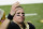New Orleans Saints quarterback Drew Brees waves to his family and fans after an NFL divisional round playoff football game against the Tampa Bay Buccaneers, Sunday, Jan. 17, 2021, in New Orleans. The Buccaneers won 30-20. (AP Photo/Brynn Anderson)