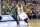 Utah Jazz guard Elijah Millsap (13) drives around Boston Celtics guard Marcus Thornton (4) in the third quarter during an NBA basketball game Monday, Jan. 26, 2015, in Salt Lake City. The Celtics won 99-90. (AP Photo/Rick Bowmer)
