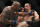 Robert Whittaker, right, and Yoel Romero fight during their middleweight title bout at the UFC 225 mixed martial arts event early Sunday, June 10, 2018, in Chicago. (AP Photo/Jim Young)