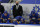 Buffalo Sabres head coach Ralph Krueger, top center, looks on during the third period of an NHL hockey game against the Pittsburgh Penguins, Saturday, March 13, 2021, in Buffalo, N.Y. (AP Photo/Jeffrey T. Barnes)