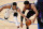 Milwaukee Bucks' Giannis Antetokounmpo, left, steals the ball from Philadelphia 76ers' Tobias Harris during the first half of an NBA basketball game, Wednesday, March 17, 2021, in Philadelphia. (AP Photo/Matt Slocum)