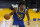 Golden State Warriors center James Wiseman (33) dribbles against the Utah Jazz during the first half of an NBA basketball game in San Francisco, Sunday, March 14, 2021. (AP Photo/Jeff Chiu)