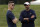 FILE - In this July 26, 2019, file photo, Chicago Bears head coach Matt Nagy, right, talks with general manager Ryan Pace during NFL football training camp in Bourbonnais, Ill. The Bears and every other team around the NFL are staring at a season like no other because of the COVID-19 pandemic. Veterans started reporting to camps this week. But instead of jumping right into the grind, they're taking a slower approach  (AP Photo/Nam Y. Huh, File)
