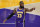 Los Angeles Lakers forward LeBron James signals to a teammate during the first half of an NBA basketball game against the Charlotte Hornets on Thursday, March 18, 2021, in Los Angeles. (AP Photo/Marcio Jose Sanchez)