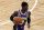 Los Angeles Lakers' Dennis Schroder plays against the Boston Celtics during the first half of an NBA basketball game, Saturday, Jan. 30, 2021, in Boston. (AP Photo/Michael Dwyer)