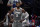 Los Angeles Clippers' Paul George watches play in the closing seconds of an NBA basketball game against the Dallas Mavericks in Dallas, Wednesday, March 17, 2021. (AP Photo/Tony Gutierrez)