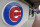 FILE - This April 15, 2013, file photo shows the Chicago Cubs logo on the exterior of Wrigley Field, in Chicago. The Chicago Cubs and Sinclair Broadcast Group are launching a regional sports network in 2020 that will be the team’s exclusive TV home. The Cubs said Wednesday, Feb. 13, 2019, the Marquee Sports Network will carry live game broadcasts and pregame and postgame coverage. (AP Photo/M. Spencer Green, File)