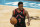 Toronto Raptors guard Kyle Lowry (7) brings the ball up court against the Charlotte Hornets during the second half of an NBA basketball game in Charlotte, N.C., Saturday, March 13, 2021. (AP Photo/Jacob Kupferman)