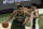 Milwaukee Bucks' Giannis Antetokounmpo tries to drive past San Antonio Spurs' Keldon Johnson during the second half of an NBA basketball game Saturday, March 20, 2021, in Milwaukee. (AP Photo/Morry Gash)