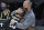 Colorado head coach Tad Boyle hugs McKinley Wright IV as he heads to the bench near the end of his teams 71-53 loss to Florida State during the second half of a second-round game in the NCAA college basketball tournament at Farmers Coliseum in Indianapolis, Monday, March 22, 2021. (AP Photo/Charles Rex Arbogast)