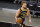 Indiana Pacers forward Domantas Sabonis (11) brings the ball up court against the Miami Heat during the first half of an NBA basketball game, Sunday, March 21, 2021, in Miami. (AP Photo/Joel Auerbach)