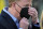 Commissioner Roger Goodell adjusts his mask before the NFL Super Bowl 55 football game between the Kansas City Chiefs and Tampa Bay Buccaneers, Sunday, Feb. 7, 2021, in Tampa, Fla. (AP Photo/David J. Phillip)