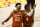 Texas' Kai Jones (22) walks off the court with teammate Greg Brown (4) after an NCAA college basketball game against Iowa State, Tuesday, March 2, 2021, in Ames, Iowa. Texas won 81-67. (AP Photo/Charlie Neibergall)