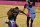 Portland Trail Blazers guard Damian Lillard (0) looks for space between Miami Heat guard Tyler Herro (14) and guard Kendrick Nunn (25) during the first half of an NBA basketball game, Thursday, March 25, 2021, in Miami. (AP Photo/Jim Rassol)