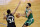 Boston Celtics' Jayson Tatum prepares to shoot against Milwaukee Bucks' Giannis Antetokounmpo (34) during the second half of an NBA basketball game Friday, March 26, 2021, in Milwaukee. (AP Photo/Aaron Gash)