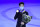 Nathan Chen of the USA stands on the podium after winning the gold medal during the Men Free Skating Program at the Figure Skating World Championships in Stockholm, Sweden, Saturday, March 27, 2021. (AP Photo/Martin Meissner)