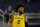 Michigan forward Isaiah Livers plays during the first half of an NCAA college basketball game, Thursday, March 4, 2021, in Ann Arbor, Mich. (AP Photo/Carlos Osorio)