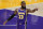 Los Angeles Lakers forward LeBron James signals to a teammate during the first half of an NBA basketball game against the Charlotte Hornets on Thursday, March 18, 2021, in Los Angeles. (AP Photo/Marcio Jose Sanchez)