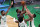 New Orleans Pelicans forward Zion Williamson, center, drives to the basket against the Boston Celtics during the first half of an NBA basketball game, Monday, March 29, 2021, in Boston. From left defending Williamson are Celtics' Marcus Smart, Robert Williams III, and Grant Williams. (AP Photo/Charles Krupa)