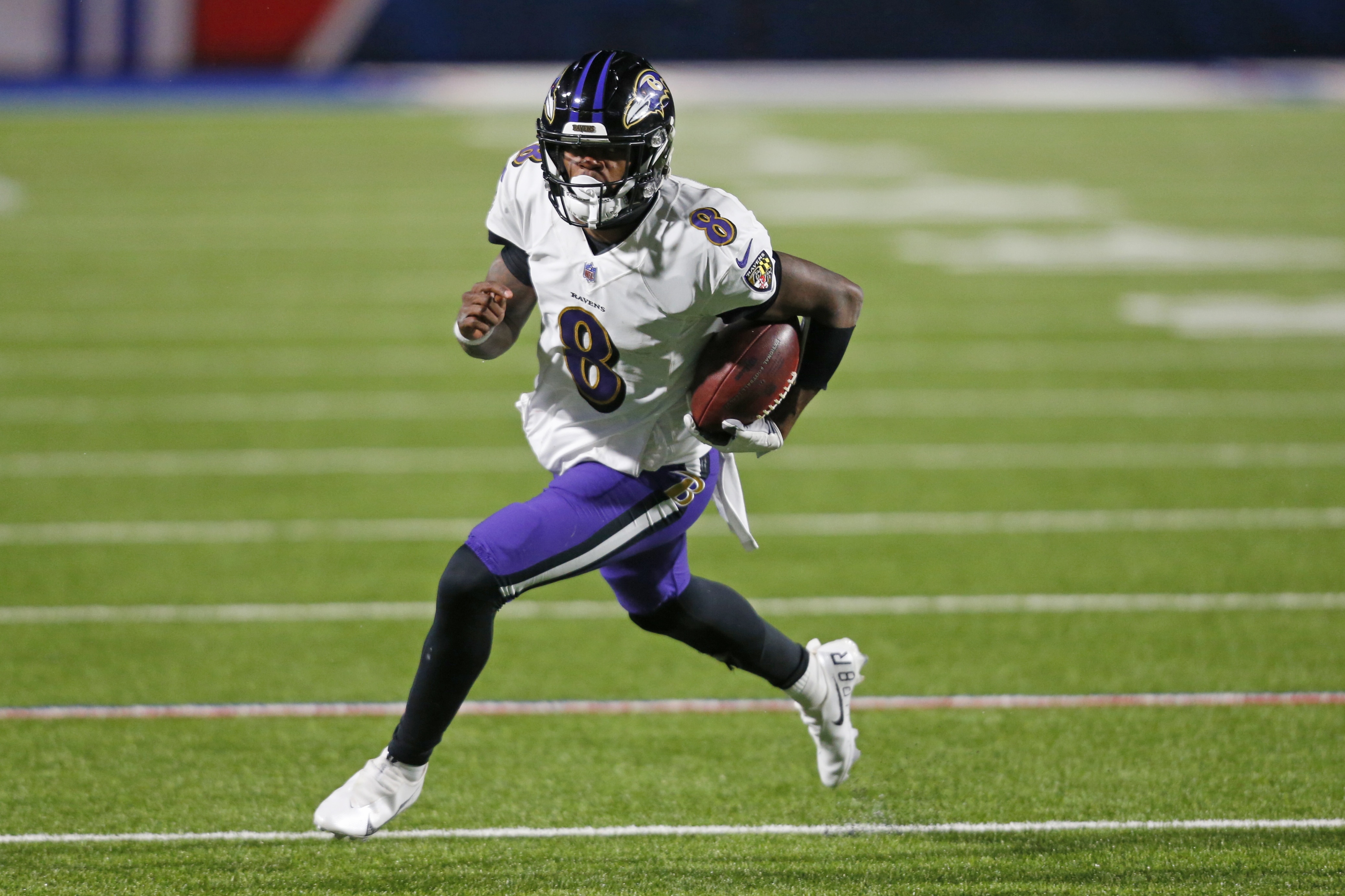 Baltimore Ravens quarterback Lamar Jackson (8) rushes during the second half of an NFL divisional round football game against the Buffalo Bills Saturday, Jan. 16, 2021, in Orchard Park, N.Y. (AP Photo/Jeffrey T. Barnes)