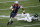 New England Patriots quarterback Cam Newton runs from New York Jets cornerback Bryce Hall in the second half of an NFL football game, Sunday, Jan. 3, 2021, in Foxborough, Mass. (AP Photo/Elise Amendola)