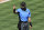 MLB umpire Angel Hernandez (5) signals during a baseball game between the Chicago Cubs and the Cincinnati Reds in Cincinnati, Sunday, Aug. 30, 2020. The Cubs won 10-1. (AP Photo/Aaron Doster)