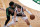 Dallas Mavericks guard Luka Doncic, right, is pressured by Boston Celtics guard Marcus Smart during the second half of an NBA basketball game Wednesday, March 31, 2021, in Boston. (AP Photo/Charles Krupa)
