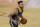 Golden State Warriors guard Stephen Curry (30) dribbles the ball up the court against the Los Angeles Lakers during the second half of an NBA basketball game in San Francisco, Monday, March 15, 2021. (AP Photo/Jeff Chiu)