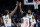 FILE - In this Monday, Feb. 3, 2020, file photo, Los Angeles Clippers' Paul George, right, celebrates with teammate Kawhi Leonard (2) after scoring against the San Antonio Spurs during the second half of an NBA basketball game, in Los Angeles. Leonard and George are healthy at the same time to start the 2020-21 season, and thatâ€™s given the Clippers a renewed sense of optimism. (AP Photo/Ringo H.W. Chiu, File)