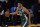 Milwaukee Bucks forward Giannis Antetokounmpo (34) controls the ball during an NBA basketball game against the Los Angeles Lakers Wednesday, March 31, 2021, in Los Angeles. (AP Photo/Ashley Landis)
