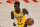 Los Angeles Lakers guard Dennis Schroder (17) controls the ball during an NBA basketball game against the Milwaukee Bucks Wednesday, March 31, 2021, in Los Angeles. (AP Photo/Ashley Landis)