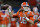 FILE - In this Friday, Jan. 1, 2021 file photo, Clemson quarterback Trevor Lawrence passes against Ohio State during the first half of the Sugar Bowl NCAA college football game in New Orleans. The last NFL event not impacted by the COVID-19 pandemic was the 2020 combine in Indianapolis. A year later, with the 2021 combine canceled, the league has released a list of players who would have merited invitations. From such high-profile quarterbacks as Clemson’s Trevor Lawrence and Ohio State’s Justin Fields to guys who sat out last season such as Oregon tackle Penei Sewell, there are 323 players from 100 schools.  (AP Photo/John Bazemore, File)