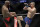 Yoel Romero, left, fights Robert Whittaker in a middleweight championship mixed martial arts bout at UFC 213, Saturday, July 8, 2017, in Las Vegas. (AP Photo/John Locher)