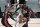 Brooklyn Nets forward Kevin Durant, center, goes up for a shot against Miami Heat forward Andre Iguodala, left, and guard Kendrick Nunn, right, during the first half of an NBA basketball game, Sunday, April 18, 2021, in Miami. (AP Photo/Wilfredo Lee)