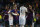 Barcelona and Manchester United players greet each others end of the Champions League quarterfinal, second leg, soccer match between FC Barcelona and Manchester United at the Camp Nou stadium in Barcelona, Spain, Tuesday, April 16, 2019. (AP Photo/Joan Monfort)